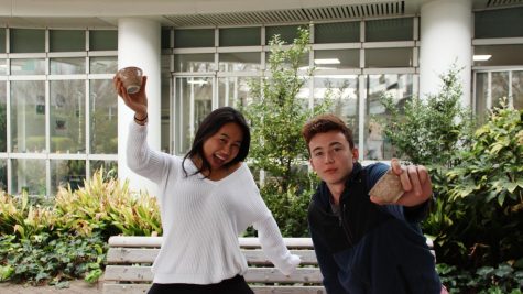 Seniors Ann-Li Hitosugi and Masa Kawasaki pose with traditional Japanese tea cups to advertise their Spillin the Tea column. Their first sip of tea” available on the site.